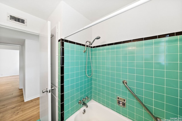435 Sharon, San Antonio, TX 78216 - full bath featuring tub / shower combination, wood finished floors, and baseboards