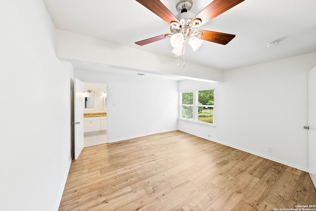 435 Sharon, San Antonio, TX 78216 - unfurnished bedroom featuring light wood-style flooring, baseboards, ensuite bathroom, and a ceiling fan