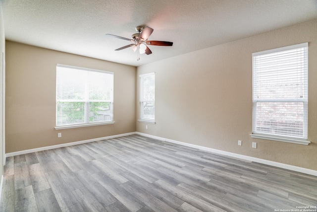 6763 Indian Ldg, San Antonio, TX 78253 - spare room with ceiling fan, wood finished floors, a textured ceiling, and baseboards