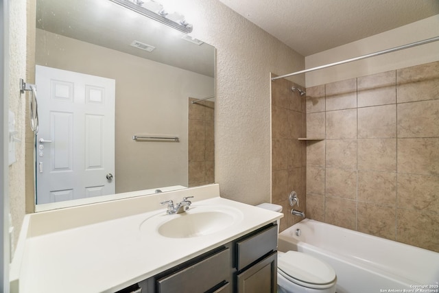 6763 Indian Ldg, San Antonio, TX 78253 - bathroom with a textured wall, toilet, vanity, shower / tub combination, and a textured ceiling