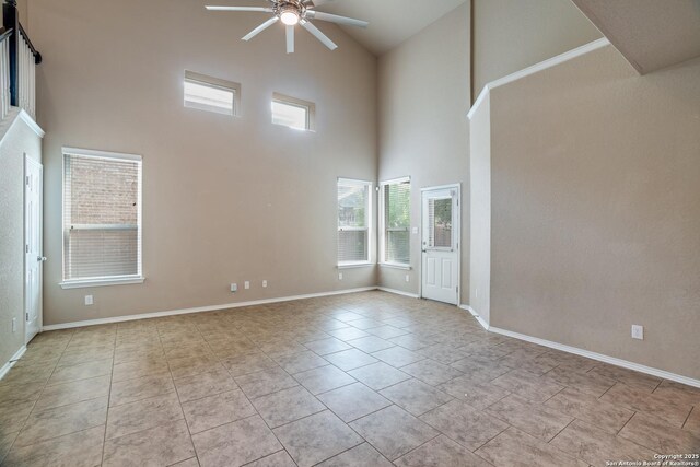 6763 Indian Ldg, San Antonio, TX 78253 - tiled empty room with high vaulted ceiling, ceiling fan, and baseboards