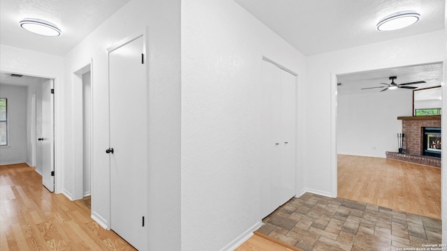 218 Gruene, New Braunfels, TX 78130 - corridor with plenty of natural light and light wood-type flooring
