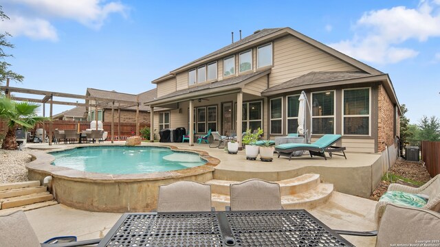 32337 Lavender Cv, Bulverde, TX 78163 - rear view of property with central AC, a patio, a fenced backyard, outdoor dining area, and a shingled roof