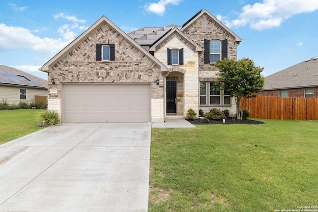 13917 Westbury Fls, San Antonio, TX 78253 - view of front of home featuring driveway, stone siding, brick siding, and a garage