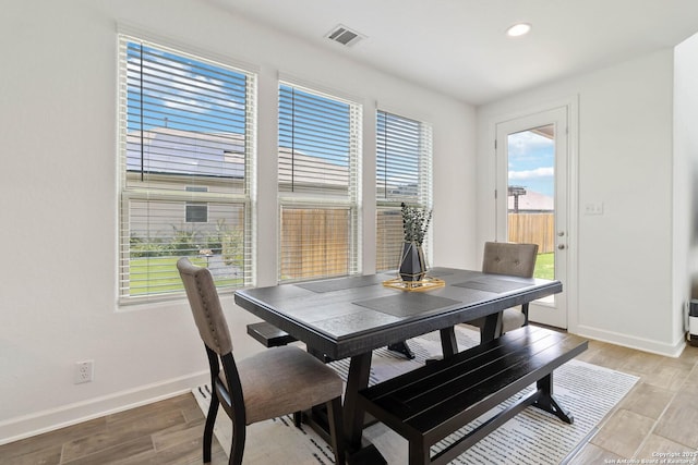 13917 Westbury Fls, San Antonio, TX 78253 - dining space with baseboards, light wood-type flooring, and recessed lighting