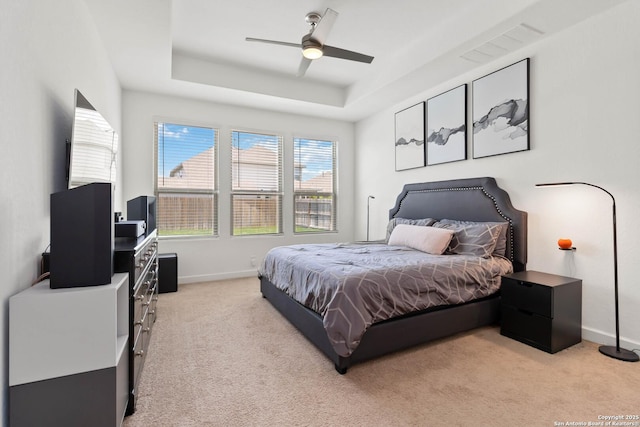 13917 Westbury Fls, San Antonio, TX 78253 - bedroom with carpet floors, a raised ceiling, baseboards, and ceiling fan