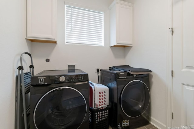 13917 Westbury Fls, San Antonio, TX 78253 - washroom featuring cabinet space, independent washer and dryer, and baseboards