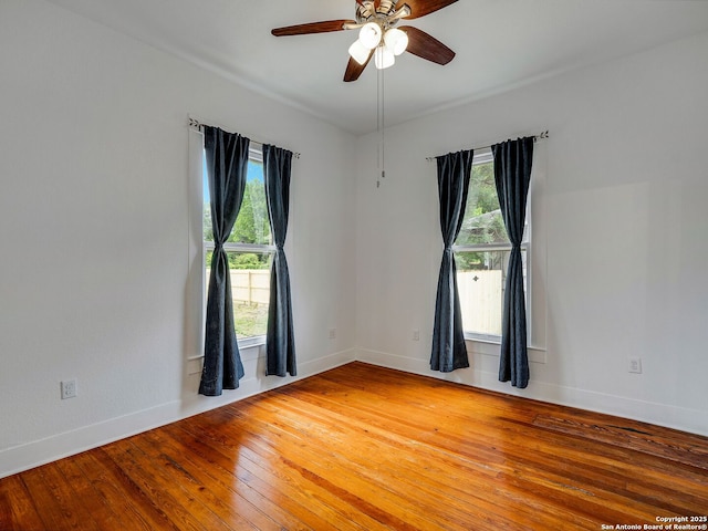 1211 W Magnolia Ave, San Antonio, TX 78201 - unfurnished room with plenty of natural light, ceiling fan, and baseboards