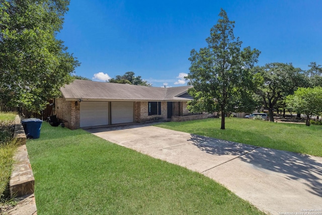 4911 Belle Ellen, San Antonio, TX 78229 - ranch-style home with an attached garage, a front lawn, brick siding, and driveway