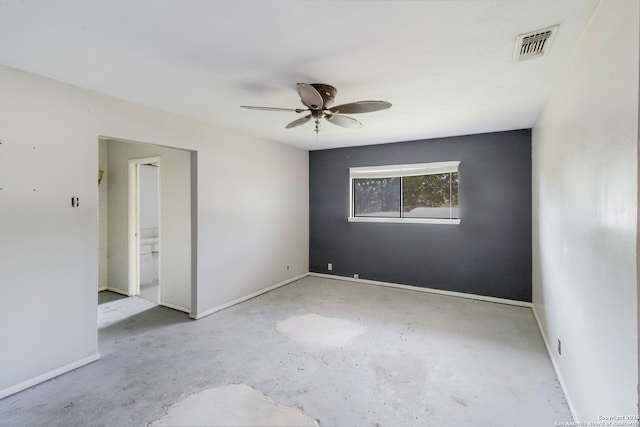 4911 Belle Ellen, San Antonio, TX 78229 - unfurnished room with unfinished concrete flooring, a ceiling fan, and baseboards