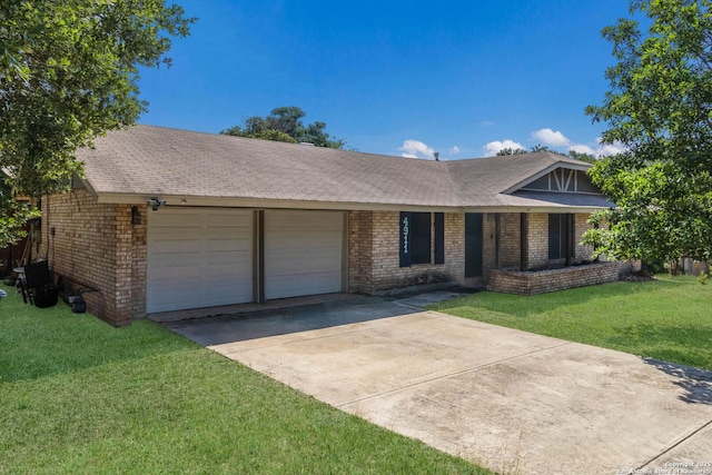4911 Belle Ellen, San Antonio, TX 78229 - ranch-style house featuring an attached garage, brick siding, a front lawn, and concrete driveway