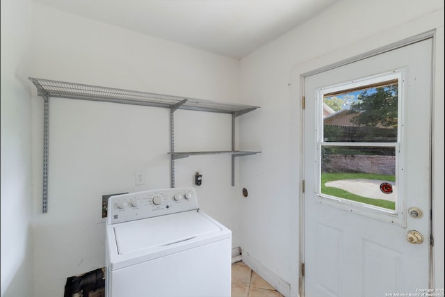4911 Belle Ellen, San Antonio, TX 78229 - laundry room featuring washer / clothes dryer and light tile patterned floors