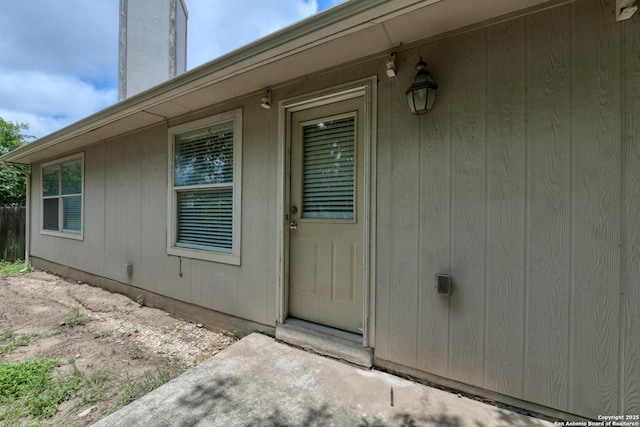 5711 Timberhurst, San Antonio, TX 78250 - entrance to property featuring a chimney