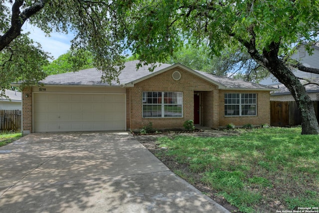 5711 Timberhurst, San Antonio, TX 78250 - ranch-style home with brick siding, a garage, and driveway