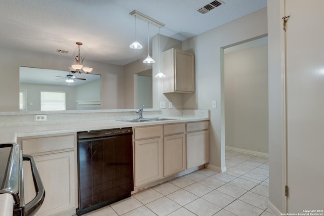 5711 Timberhurst, San Antonio, TX 78250 - kitchen with black dishwasher, stove, light countertops, and pendant lighting
