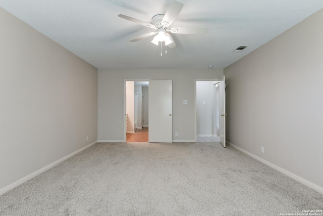 5711 Timberhurst, San Antonio, TX 78250 - unfurnished room with a ceiling fan and light colored carpet