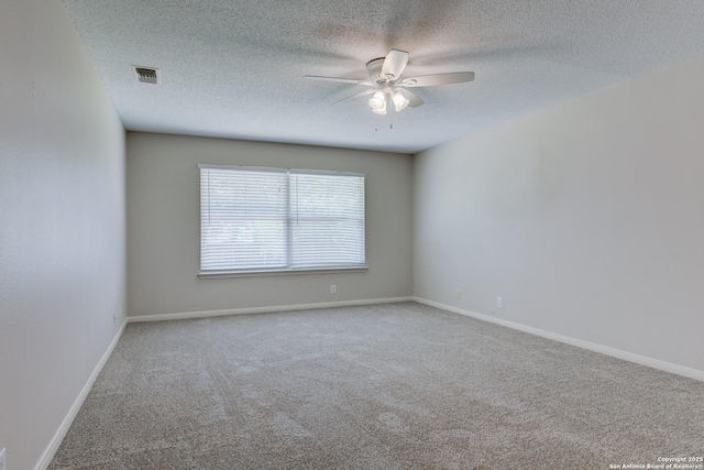 5711 Timberhurst, San Antonio, TX 78250 - spare room featuring ceiling fan, carpet, and a textured ceiling