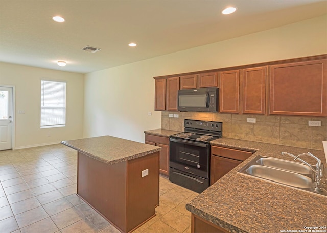 468 Salz Way, San Antonio, TX 78260 - kitchen featuring black appliances, a kitchen island, tasteful backsplash, dark countertops, and light tile patterned floors