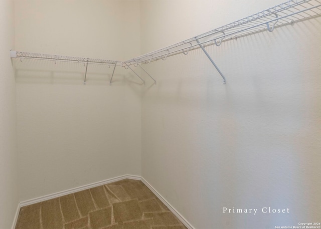 468 Salz Way, San Antonio, TX 78260 - walk in closet with dark colored carpet
