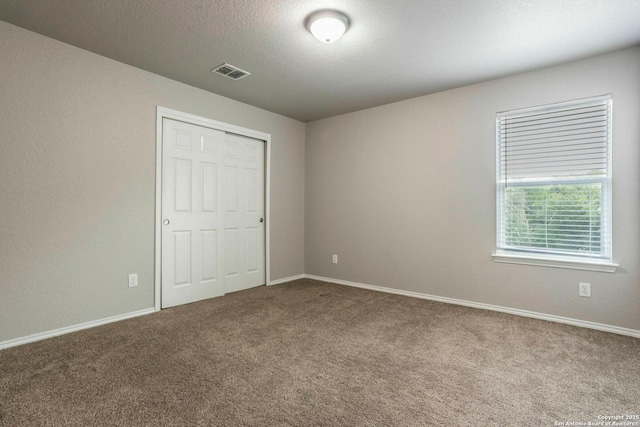 7030 Plains Way, San Antonio, TX 78253 - unfurnished bedroom featuring carpet, a closet, and baseboards