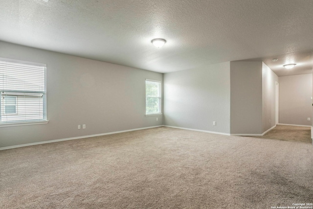 7030 Plains Way, San Antonio, TX 78253 - unfurnished room featuring carpet floors, a textured ceiling, and baseboards