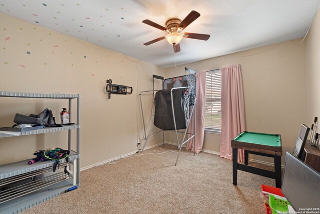 815 Maltese Gdn, San Antonio, TX 78260 - recreation room with carpet, a ceiling fan, and baseboards