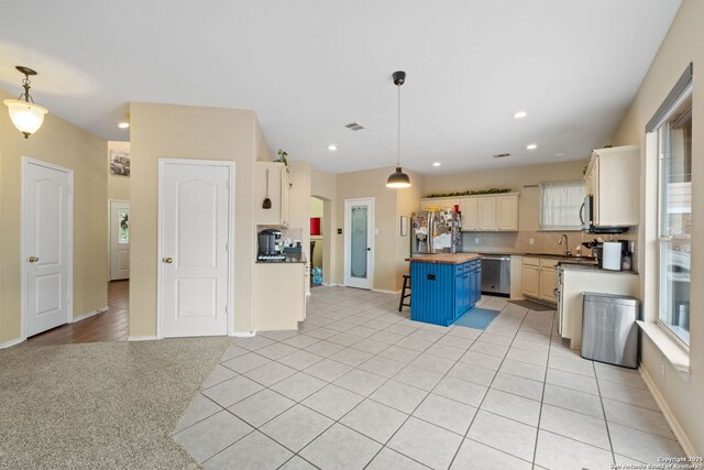815 Maltese Gdn, San Antonio, TX 78260 - kitchen with stainless steel appliances, wood counters, healthy amount of natural light, tasteful backsplash, and recessed lighting