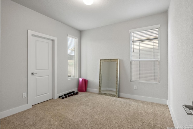 8851 Oakland Rd, San Antonio, TX 78240 - carpeted empty room with baseboards