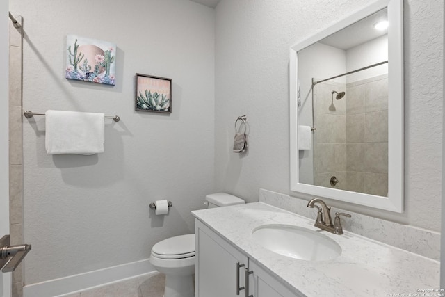 8851 Oakland Rd, San Antonio, TX 78240 - full bathroom with vanity, toilet, tile patterned flooring, and a tile shower