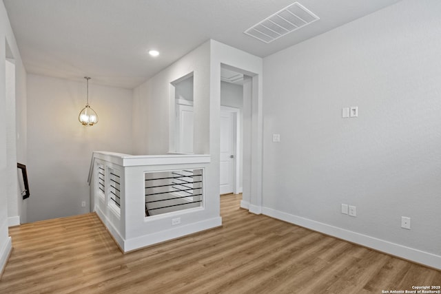 8851 Oakland Rd, San Antonio, TX 78240 - spare room with light wood-type flooring, baseboards, and recessed lighting