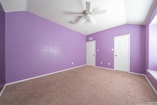 10736 Gemsbuck Ldg, San Antonio, TX 78245 - unfurnished bedroom with vaulted ceiling, carpet flooring, ceiling fan, and baseboards
