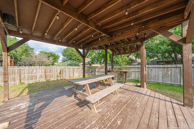 10736 Gemsbuck Ldg, San Antonio, TX 78245 - wooden terrace featuring a fenced backyard and outdoor dining space