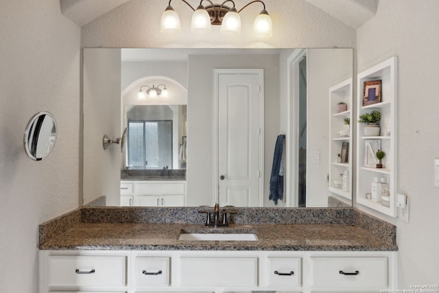 25723 Coreopsis, San Antonio, TX 78261 - bathroom with a textured wall and vanity