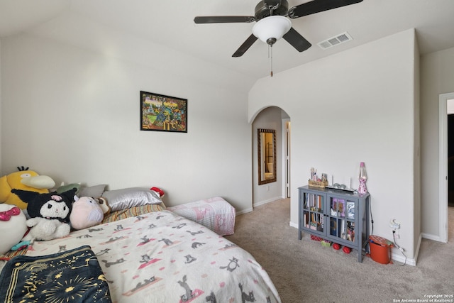 25723 Coreopsis, San Antonio, TX 78261 - bedroom featuring arched walkways, carpet flooring, vaulted ceiling, baseboards, and ceiling fan