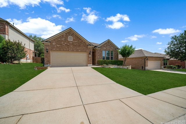 1014 Windy Pond, San Antonio, TX 78260 - view of front of home with brick siding, a front yard, and concrete driveway