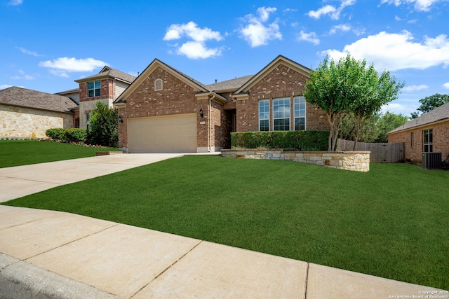 1014 Windy Pond, San Antonio, TX 78260 - view of front of house featuring brick siding, concrete driveway, a garage, and central air condition unit