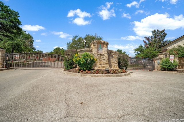 1014 Windy Pond, San Antonio, TX 78260 - community sign with a gate