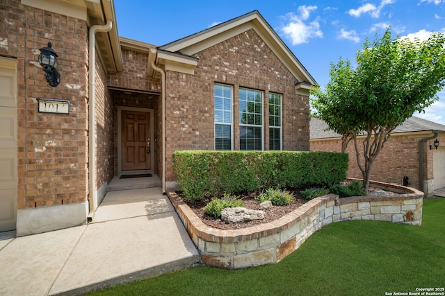 1014 Windy Pond, San Antonio, TX 78260 - entrance to property featuring brick siding and a lawn