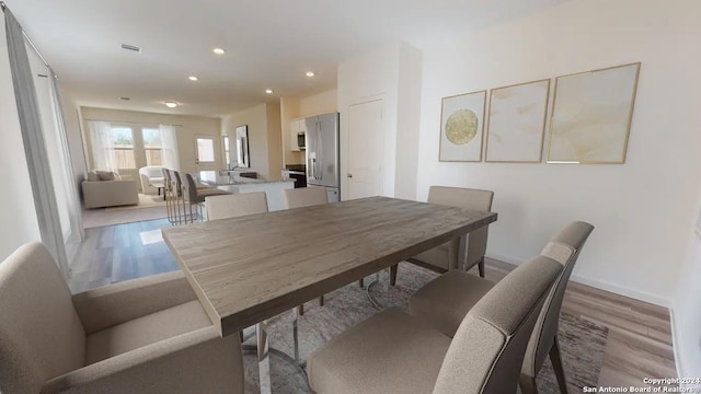 15018 Painted Hls, San Antonio, TX 78253 - dining area with wood finished floors and recessed lighting