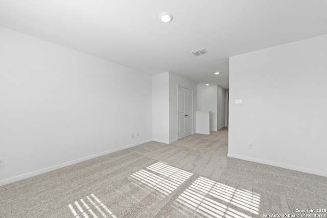 11502 Bald Eagle Hts, San Antonio, TX 78223 - unfurnished room featuring light colored carpet, recessed lighting, and baseboards