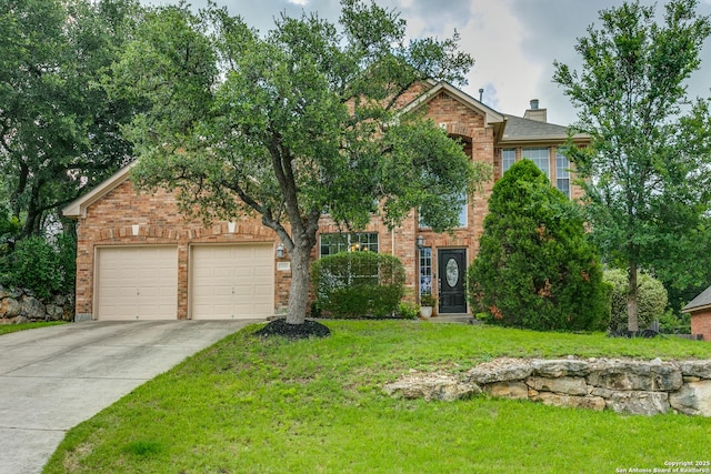 3330 Edge Vw, San Antonio, TX 78259 - view of front of house with brick siding, an attached garage, driveway, a front lawn, and a chimney