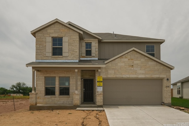 10310 Tule Creek Frk, San Antonio, TX 78252 - craftsman house with stone siding, concrete driveway, and roof with shingles