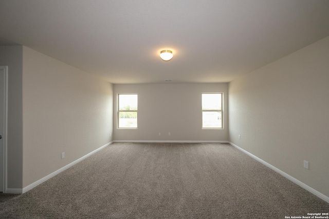 10310 Tule Creek Frk, San Antonio, TX 78252 - carpeted empty room featuring baseboards