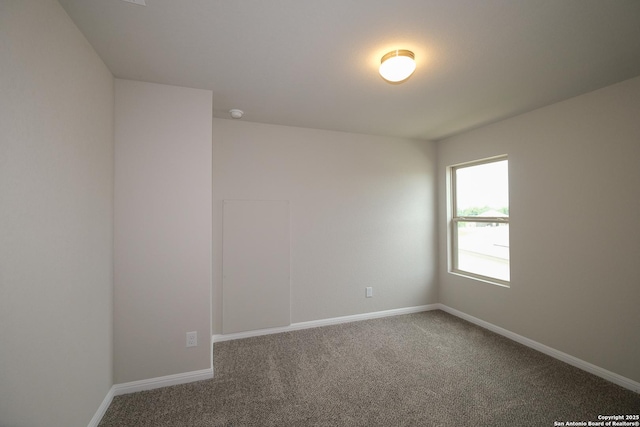 10310 Tule Creek Frk, San Antonio, TX 78252 - spare room featuring carpet and baseboards