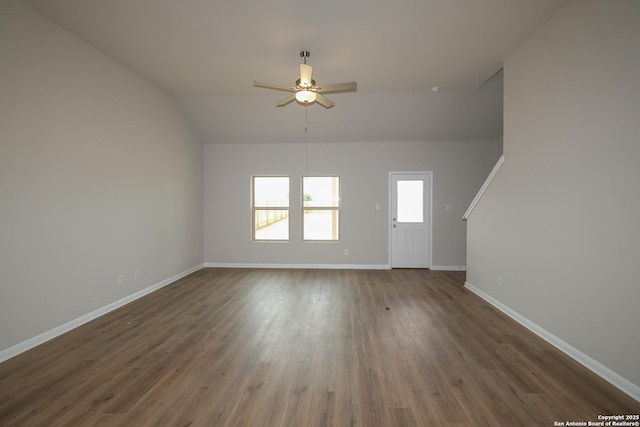 10310 Tule Creek Frk, San Antonio, TX 78252 - unfurnished living room with a ceiling fan, baseboards, wood finished floors, and vaulted ceiling