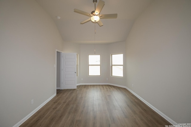 10310 Tule Creek Frk, San Antonio, TX 78252 - unfurnished room with dark wood finished floors, baseboards, high vaulted ceiling, ceiling fan, and a smoke detector