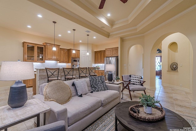 16006 N Huebner Blf, San Antonio, TX 78248 - living area featuring arched walkways, ornamental molding, recessed lighting, light tile patterned flooring, and baseboards