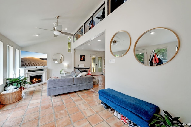 106 Mayflower, Alamo Heights, TX 78209 - living area featuring ceiling fan, a lit fireplace, lofted ceiling, recessed lighting, and light tile patterned flooring