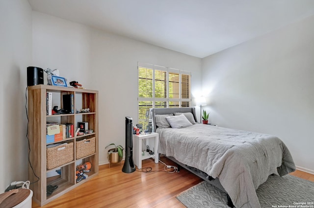 106 Mayflower, Alamo Heights, TX 78209 - bedroom featuring wood finished floors