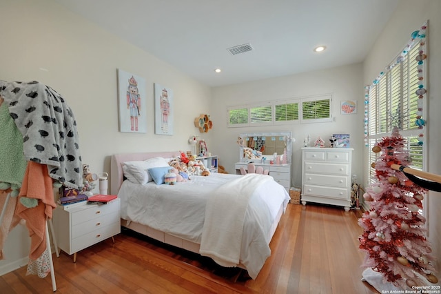 106 Mayflower, Alamo Heights, TX 78209 - bedroom featuring wood finished floors and recessed lighting